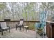 Deck with a chair and small table that provides a nice space to relax at 1808 W Cotton Gin Dr, Clayton, NC 27527