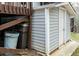 Side exterior of house with access to a storage area under the deck at 1808 W Cotton Gin Dr, Clayton, NC 27527