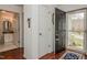 Inviting foyer with wood floors, a closet, and an open view to the bathroom at 1808 W Cotton Gin Dr, Clayton, NC 27527