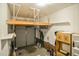 A spacious single-car garage with additional overhead storage and durable brick accents at 1808 W Cotton Gin Dr, Clayton, NC 27527