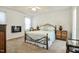 Inviting main bedroom with a ceiling fan, cozy carpet, and a comfortable bed for restful nights at 1808 W Cotton Gin Dr, Clayton, NC 27527