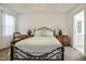 Well-lit main bedroom featuring a ceiling fan, cozy carpet, and a comfortable bed for restful nights at 1808 W Cotton Gin Dr, Clayton, NC 27527