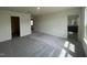 Spacious bedroom featuring plush carpet and natural light from large windows at 190 Chestnut Oak Ln, Lillington, NC 27546