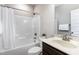 Bathroom featuring a shower/tub combo with tile surround, toilet, and vanity at 191 W Cultivator Way, Clayton, NC 27520