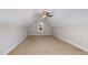 Spacious bedroom featuring neutral walls, carpeted flooring, and a window overlooking the neighborhood at 191 W Cultivator Way, Clayton, NC 27520
