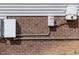 Home equipped with Tesla wall battery power system and exterior brick wall at 191 W Cultivator Way, Clayton, NC 27520