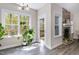 Living area with large windows, fireplace and access to the deck at 191 W Cultivator Way, Clayton, NC 27520