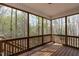 Cozy screened porch with wood floors and a view of the trees at 191 W Cultivator Way, Clayton, NC 27520