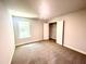 Bedroom with neutral paint, carpet, and a walk in closet at 193 Falls Of The Cape Dr, Lillington, NC 27546