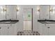 Bathroom featuring a double vanity with modern fixtures at 20 Serenity Woods Trl, Franklinton, NC 27525