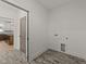Laundry room with brick floor, neutral walls, and connection for dryer hookup at 20 Serenity Woods Trl, Franklinton, NC 27525