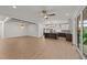 Spacious living room with wood floors, decorative lighting, and an open layout perfect for modern living at 20 Serenity Woods Trl, Franklinton, NC 27525
