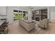 Bright living room featuring a fireplace, backyard views, and a neutral color palette with natural light at 20 Serenity Woods Trl, Franklinton, NC 27525
