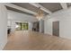 Bright and airy living room with a fireplace, wood floors, and sliding doors to the deck at 20 Serenity Woods Trl, Franklinton, NC 27525