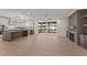 Open-concept space with a kitchen, living room, and access to a deck, perfect for entertaining at 20 Serenity Woods Trl, Franklinton, NC 27525