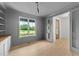 Office with built-in shelving and light wood-look flooring at 20 Serenity Woods Trl, Franklinton, NC 27525