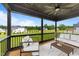 Relaxing outdoor porch with comfortable seating and scenic views of the lush backyard landscape at 20 Serenity Woods Trl, Franklinton, NC 27525