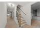 Staircase with hardwood railings and metal balusters at 20 Serenity Woods Trl, Franklinton, NC 27525