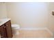 Modest bathroom featuring tile flooring, a toilet, and a vanity with a sink at 202 Allen St # A/B, Creedmoor, NC 27522