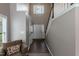 Spacious foyer featuring a staircase, hardwood floors, and natural light at 206 Newberry Ln, Durham, NC 27703