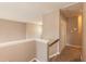 This well-lit upstairs hallway leads to the bedrooms at 206 Newberry Ln, Durham, NC 27703