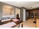 This eat-in kitchen features stainless steel appliances, tile floors, and wood cabinets at 206 Newberry Ln, Durham, NC 27703