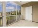 Inviting screened porch with white trim, siding, and an entry door, perfect for outdoor relaxation and enjoying the surrounding views at 207 Wildfell Trl, Cary, NC 27513