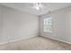 Neutral bedroom with carpet flooring, ceiling fan, a window, and natural light at 2100 Thornblade Dr, Raleigh, NC 27604