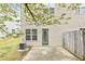 Back of home featuring a small patio and a fenced in yard at 2100 Thornblade Dr, Raleigh, NC 27604