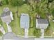 Overhead view showcases the layout of the home, yard, patio, and surrounding neighborhood at 2112 Queensway Ct, Creedmoor, NC 27522