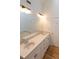 Bright bathroom featuring double sinks, a soaking tub, and ample counter space at 212 Blueridge Rd, Carrboro, NC 27510