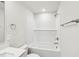 Bathroom featuring shower-tub combo, modern fixtures and a white vanity at 2207 Cherry Creek Rd, Haw River, NC 27258
