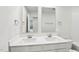 Bathroom featuring double sink vanity with modern fixtures and ample counter space at 2207 Cherry Creek Rd, Haw River, NC 27258