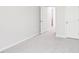 Bright bedroom shows neutral carpeting and door leading to adjoining spaces at 2207 Cherry Creek Rd, Haw River, NC 27258