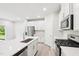 Modern kitchen with stainless steel appliances, a center island, and plenty of counter space at 2207 Cherry Creek Rd, Haw River, NC 27258
