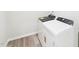 Laundry area with modern white washer and dryer at 2207 Cherry Creek Rd, Haw River, NC 27258