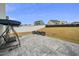 Large backyard with a patio, seating, and a swing, perfect for outdoor enjoyment at 235 Mallard Loop Dr, Clayton, NC 27527