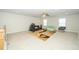 Bonus room featuring neutral carpet, ample natural light, and comfortable seating perfect for recreation at 235 Mallard Loop Dr, Clayton, NC 27527
