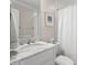 Elegant bathroom featuring a marble vanity and white tile at 2714 Gordon St, Raleigh, NC 27608