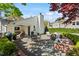 Outdoor patio with furniture, landscaping, and a fire pit at 2714 Gordon St, Raleigh, NC 27608