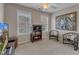 Comfortable bedroom with carpet, neutral walls, two windows and some furniture at 317 Briarfield Dr, Apex, NC 27502
