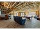 Unfinished basement featuring exposed wood frame, pool table, bar, and plenty of space at 3220 Brassfield Rd, Creedmoor, NC 27522