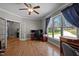 Bright home office with ample natural light and modern desk at 3220 Brassfield Rd, Creedmoor, NC 27522