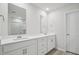 Large bathroom with dual sinks, spacious vanity, and a walk-in shower at 3849 Rosebush Dr, Zebulon, NC 27597