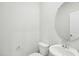 Half bathroom featuring a single vanity, mirror, and toilet at 3849 Rosebush Dr, Zebulon, NC 27597