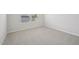 Carpeted bedroom with a window and two walls at 3849 Rosebush Dr, Zebulon, NC 27597