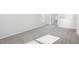 Bright bedroom with neutral carpet, natural light, and a clean, modern aesthetic at 3849 Rosebush Dr, Zebulon, NC 27597
