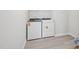 Laundry room features new appliances and hard surface flooring at 3849 Rosebush Dr, Zebulon, NC 27597