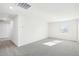 Spacious living room featuring neutral carpet, a large window, and neutral paint at 3849 Rosebush Dr, Zebulon, NC 27597