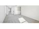 Spacious living room featuring neutral carpet, a large window, and neutral paint at 3849 Rosebush Dr, Zebulon, NC 27597